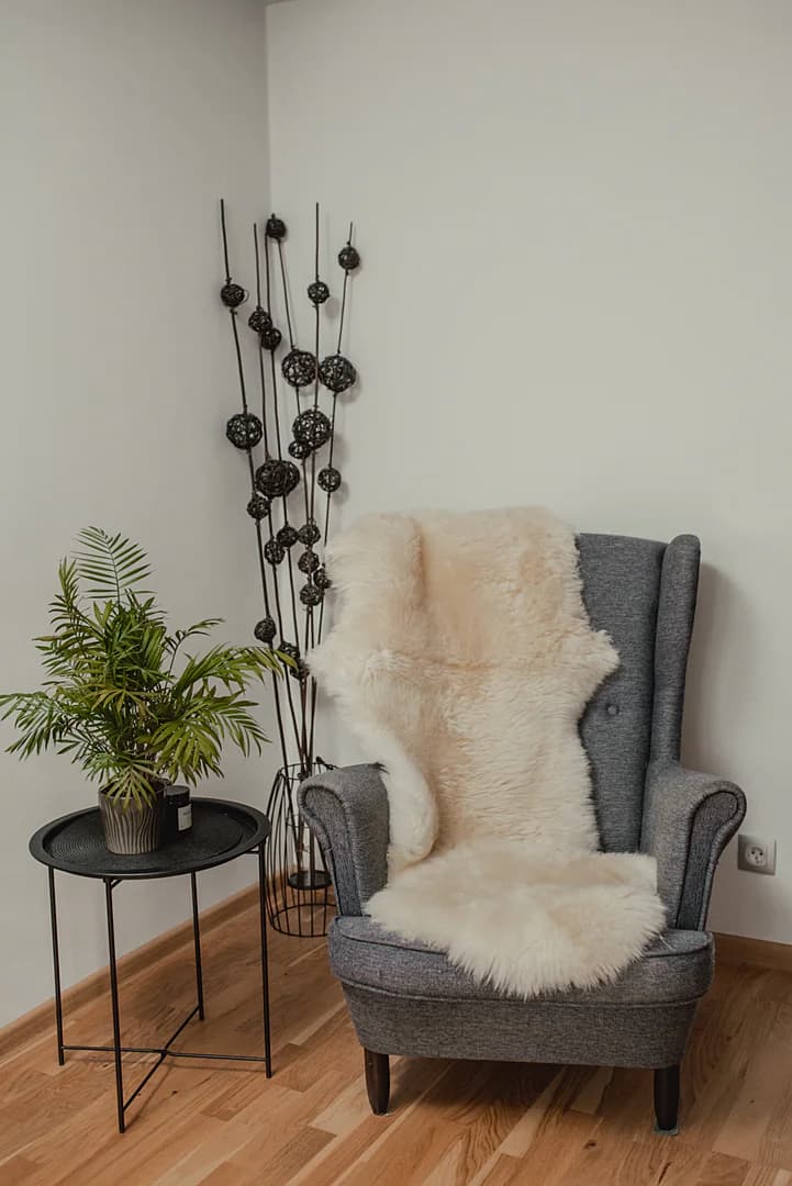 Two stitched sheepskins, white