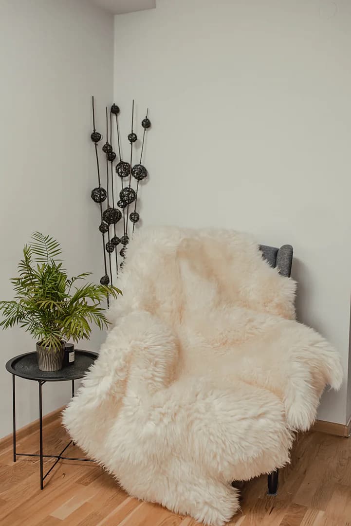 Six stitched sheepskins, white